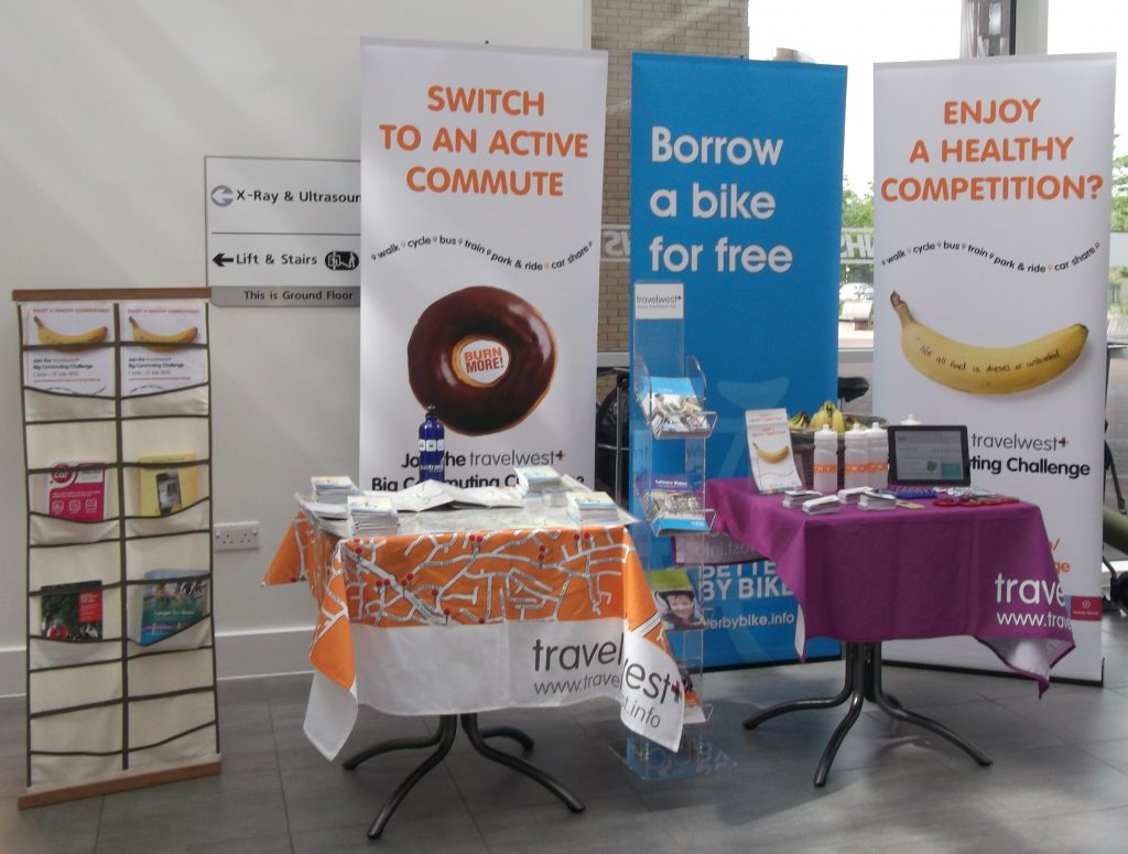 Travelwest stands are easily identifiable by looking for Travelwest logos on banners and table cloths.
