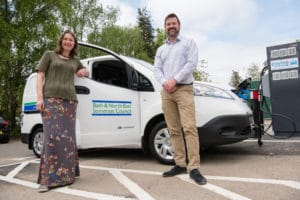 Councillor Sarah Warren and Councillor Kevin Guy, Council Leader, at one of the new electric vehicle charging points in Bath