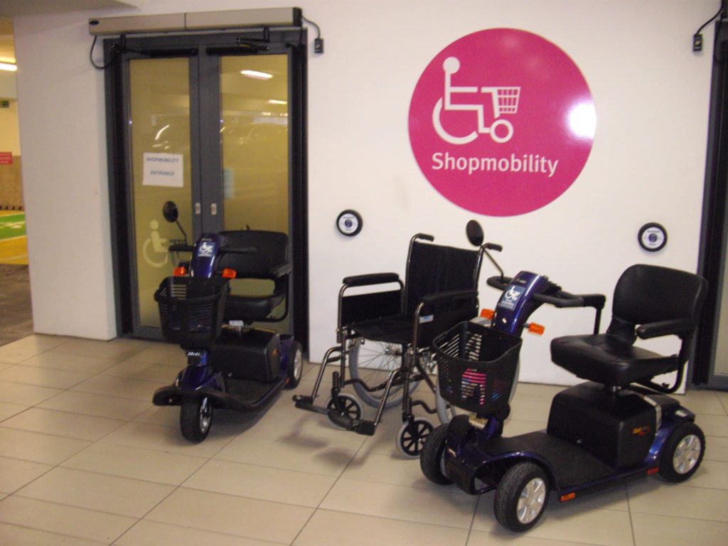 mobility scooters and wheelchair outside Bristol Shopmobility