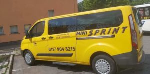 The Sprint yellow and black minibus