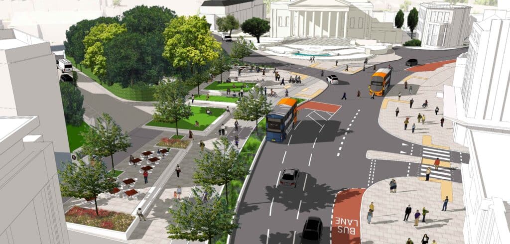 An artist’s impression of the road layout on Queens Road looking towards the Victoria Rooms with a large area of public space that has grassed areas, seating, trees and planting.