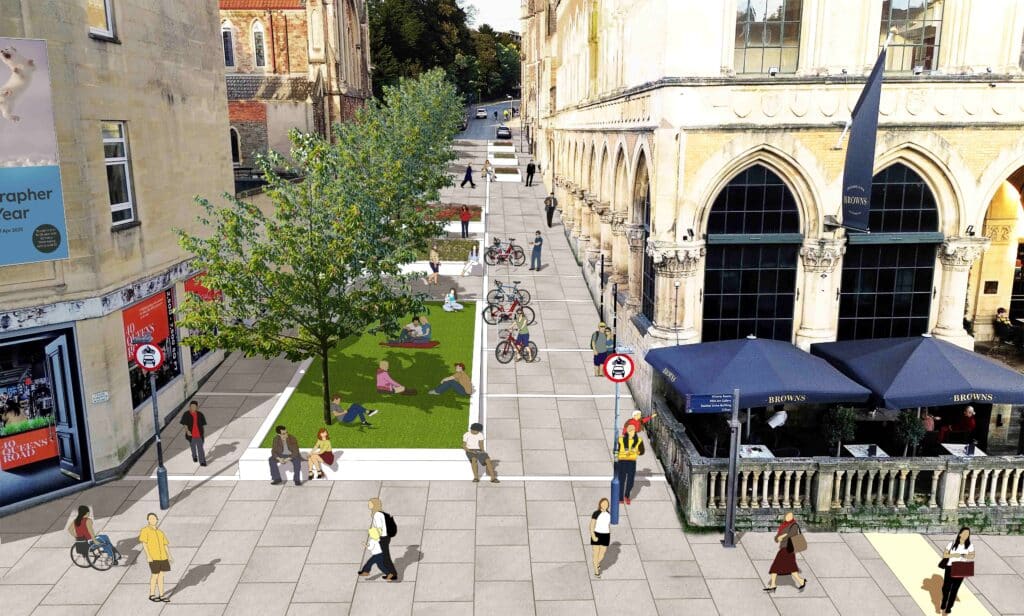 An artist’s impression showing the new public space on University Road with a wide pavement either side of green space in the middle with trees, planting and seating.